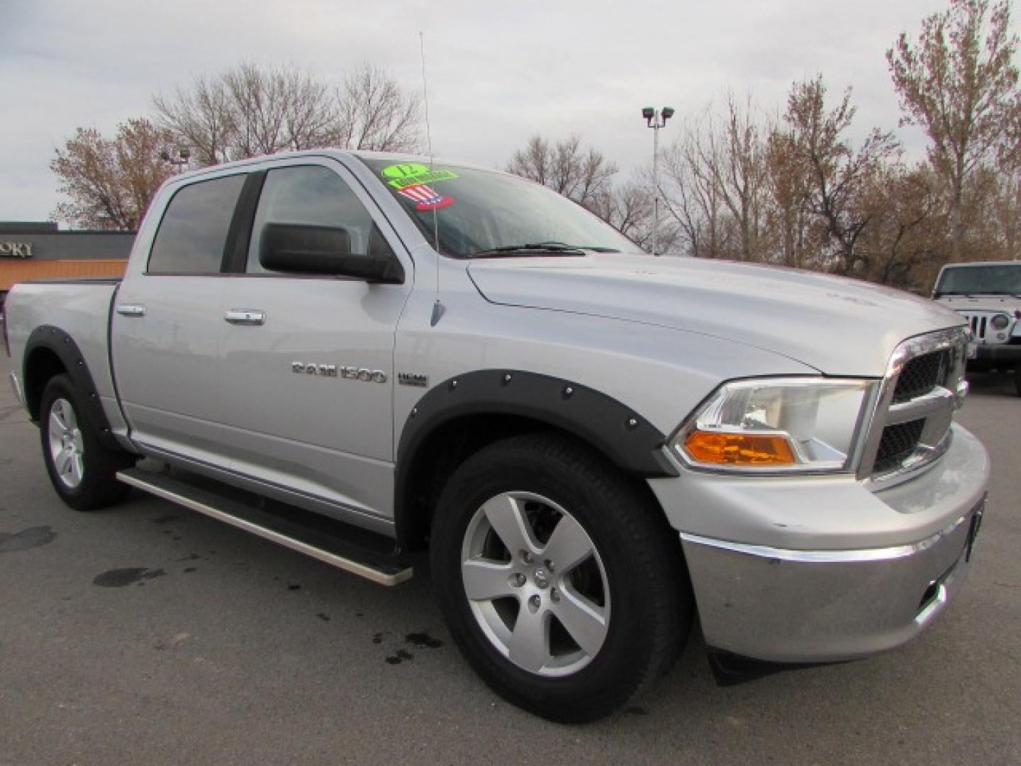 2012 Silver /Gray Dodge Ram 1500 SLT Crew Cab 4WD (1C6RD7LT0CS) with an 5.7L V8 OHV 16V engine, 6-Speed Automatic transmission, located at 4562 State Avenue, Billings, MT, 59101, (406) 896-9833, 45.769516, -108.526772 - 2012 Dodge Ram 1500 SLT Crew Cab 4WD - Low miles! 5.7L V8 OHV 16V Hemi Engine - 6 speed automatic transmission - 4 wheel drive - 119,645 miles - Inspected and serviced - copy of inspection and work performed as well as full vehicle history report provided SLT package - air conditioning - tilt - Photo#0